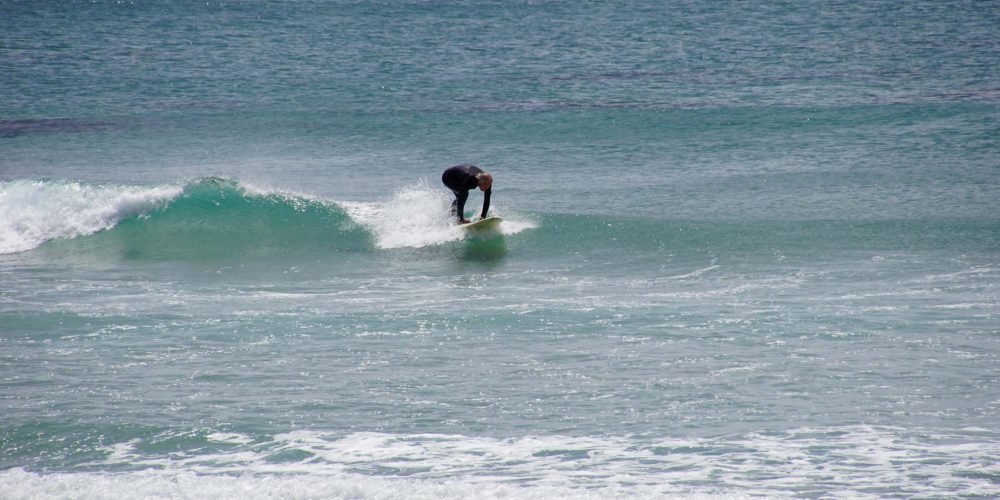 Surfen am Mangawhai Heads Beach